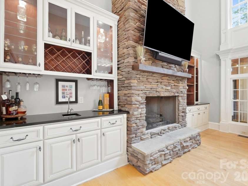 2930 Sweetgrass Lane, Monroe, NC 28112.  MLS# CAR4418923, YatesRealty ID 54232. Custom Built-ins both sides of the fireplace