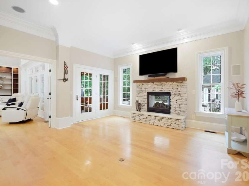 2930 Sweetgrass Lane, Monroe, NC 28112.  MLS# CAR4418923, YatesRealty ID 54232. Den with Fireplace