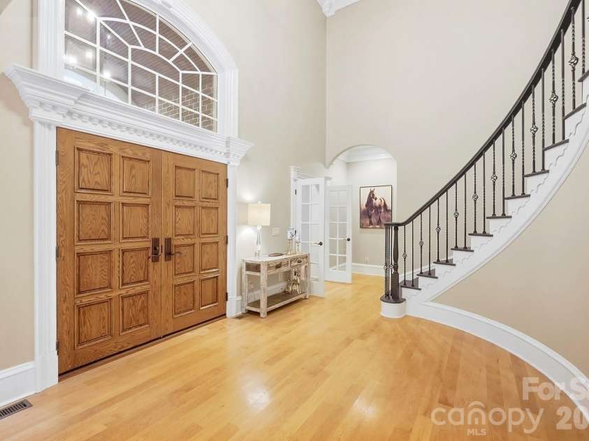 2930 Sweetgrass Lane, Monroe, NC 28112.  MLS# CAR4418923, YatesRealty ID 54232. Grand Staircase