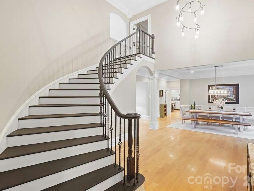 2930 Sweetgrass Lane, Monroe, NC 28112.  MLS# CAR4418923, YatesRealty ID 54232. Grand Staircase