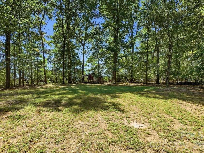 2930 Sweetgrass Lane, Monroe, NC 28112.  MLS# CAR4418923, YatesRealty ID 54232. Large Grass areas
