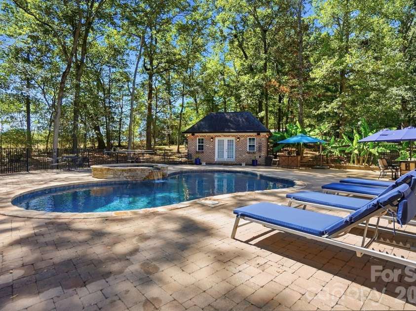 2930 Sweetgrass Lane, Monroe, NC 28112.  MLS# CAR4418923, YatesRealty ID 54232. Saltwater Pool with Jacuzzi