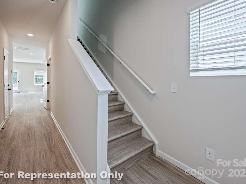 164 Sycamore Street, Mooresville, NC 28115.  MLS# CAR4231421, YatesRealty ID 5424. Stairway
