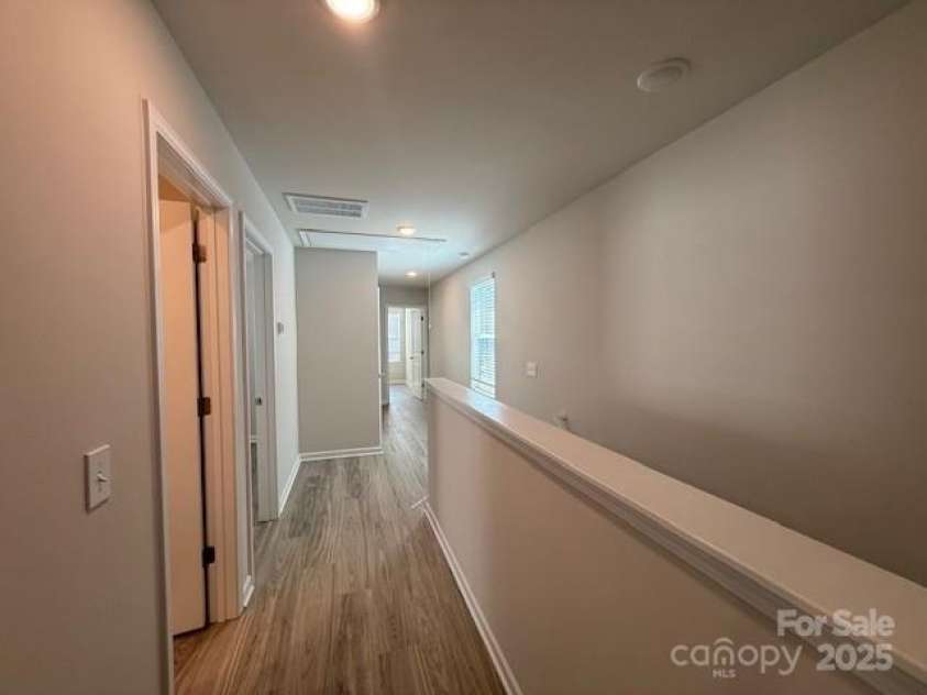 164 Sycamore Street, Mooresville, NC 28115.  MLS# CAR4231421, YatesRealty ID 5424. Upper Hallway