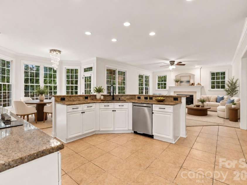 3439 Twelve Oaks Place, Charlotte, NC 28270.  MLS# CAR4423382, YatesRealty ID 54247. Virtually Staged Kitchen, Breakfast Area and Den