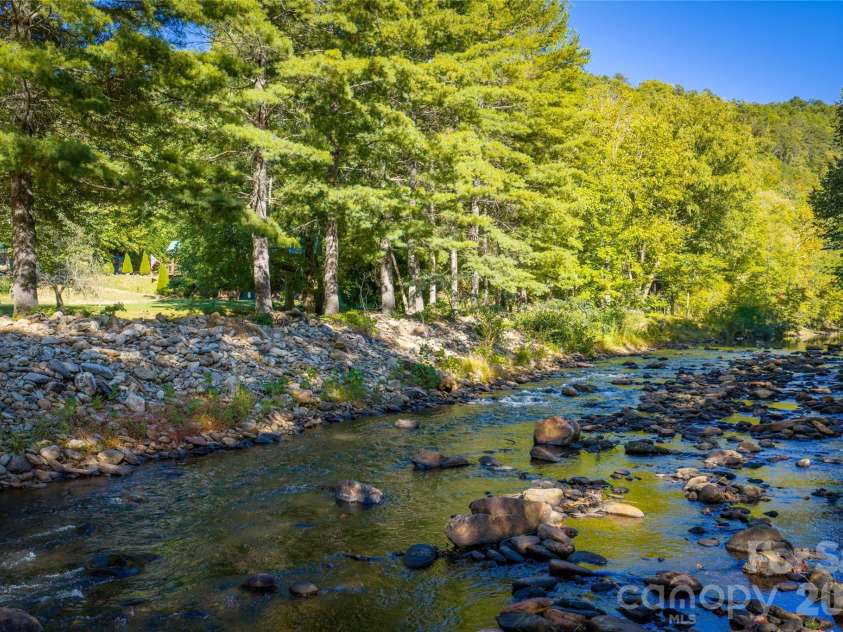 28 Froggy Bottom Trail, Canton, NC 28716.  MLS# CAR4429892, YatesRealty ID 54250. Bold West Fork with HOA waterfront park area along the river.