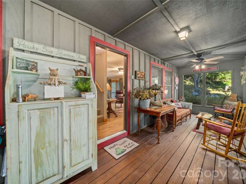 28 Froggy Bottom Trail, Canton, NC 28716.  MLS# CAR4429892, YatesRealty ID 54250. Screened porch faces the river