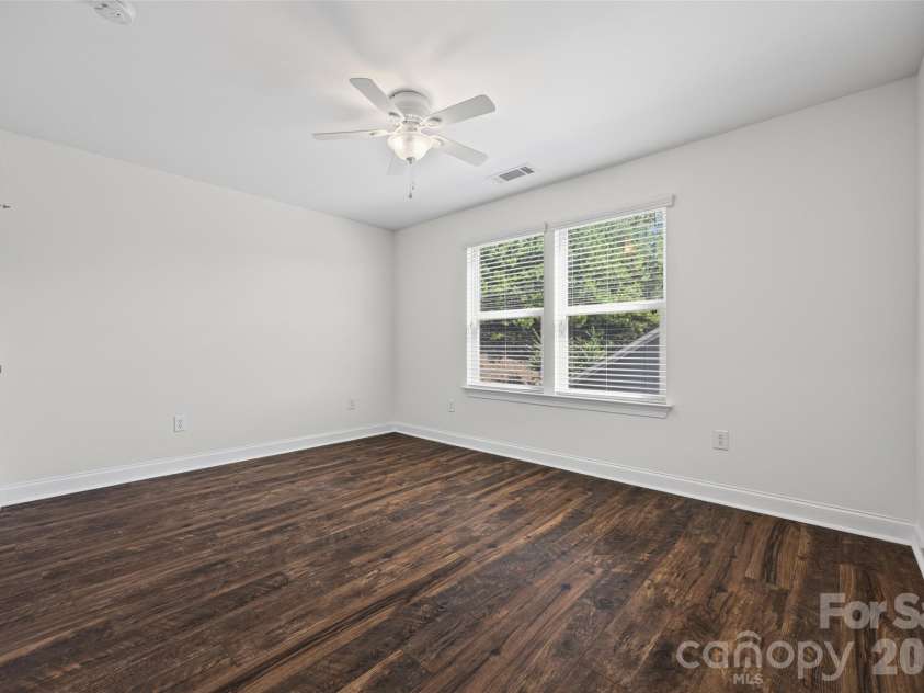 17015 Challory Glen Way, Charlotte, NC 28278.  MLS# CAR4429869, YatesRealty ID 54266. Fourth bedroom on second floor w/ full bath and custom closet.