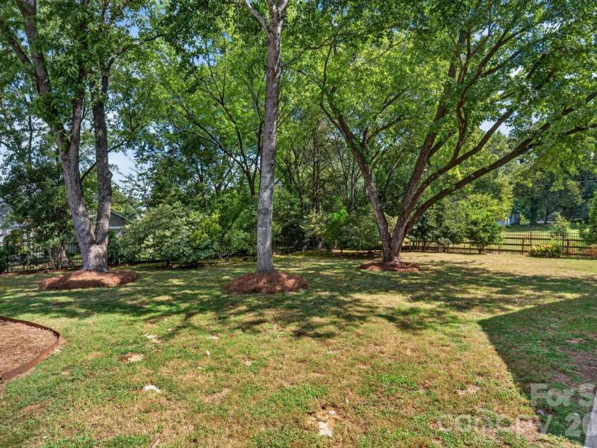 2021 Lynbridge Drive, Charlotte, NC 28270.  MLS# CAR4429842, YatesRealty ID 54271. Backyard