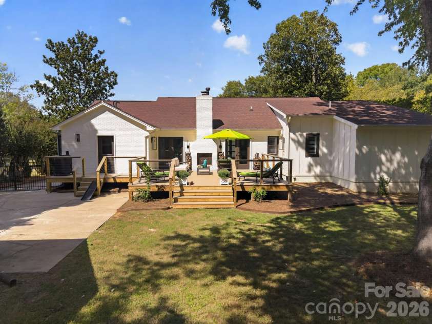 2021 Lynbridge Drive, Charlotte, NC 28270.  MLS# CAR4429842, YatesRealty ID 54271. New Deck with Fireplace