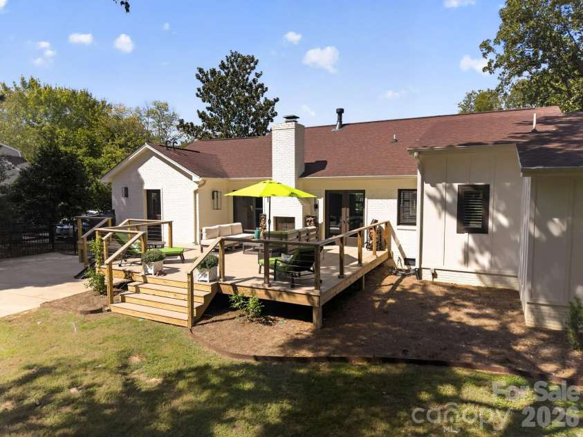 2021 Lynbridge Drive, Charlotte, NC 28270.  MLS# CAR4429842, YatesRealty ID 54271. New Deck with Fireplace