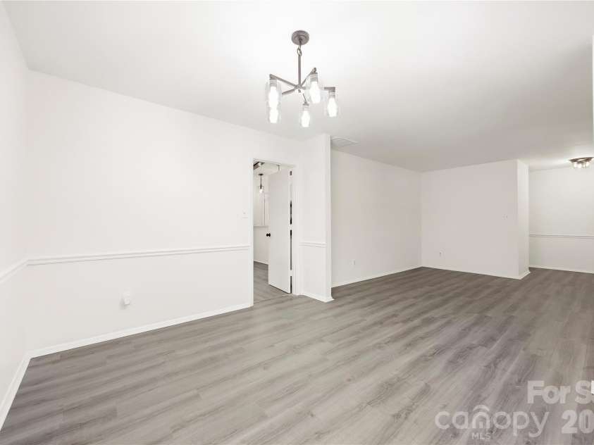 9112 Sardis Forest Drive, Charlotte, NC 28270.  MLS# CAR4429591, YatesRealty ID 54276. Dining and Living Room - Open Layout