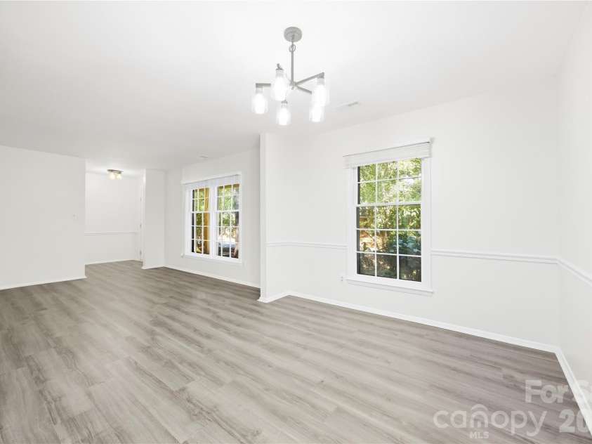 9112 Sardis Forest Drive, Charlotte, NC 28270.  MLS# CAR4429591, YatesRealty ID 54276. Dining and Living Room - Open Layout