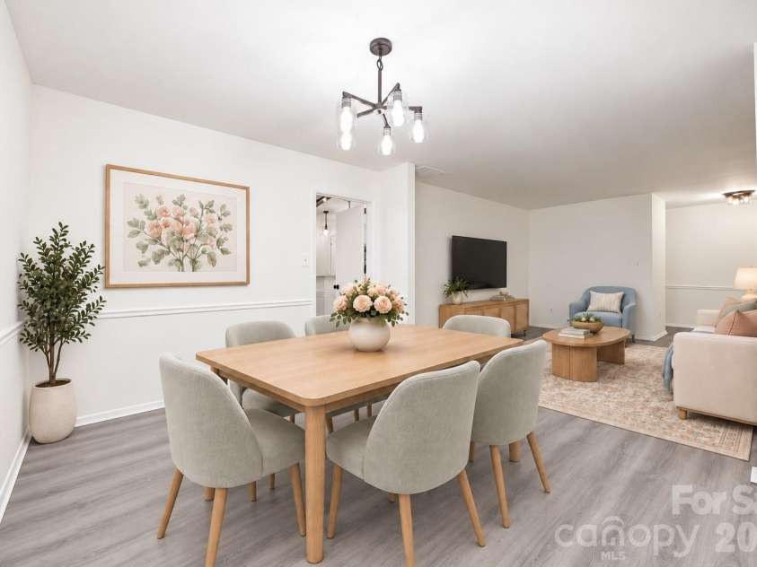 9112 Sardis Forest Drive, Charlotte, NC 28270.  MLS# CAR4429591, YatesRealty ID 54276. Dining and Living Room - Virtually Staged