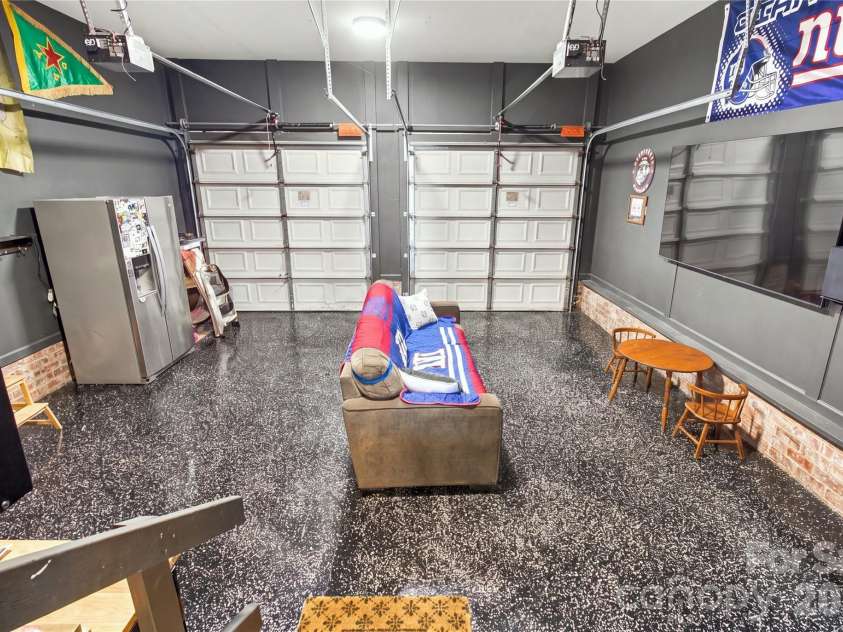 613 Weyburn Drive, Concord, NC 28027.  MLS# CAR4429477, YatesRealty ID 54278. Garage with epoxy flooring