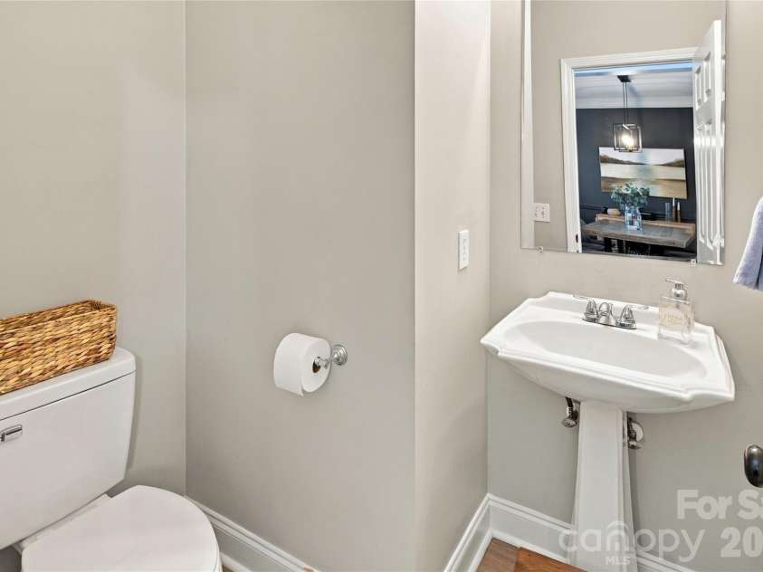 613 Weyburn Drive, Concord, NC 28027.  MLS# CAR4429477, YatesRealty ID 54278. Half bath downstairs