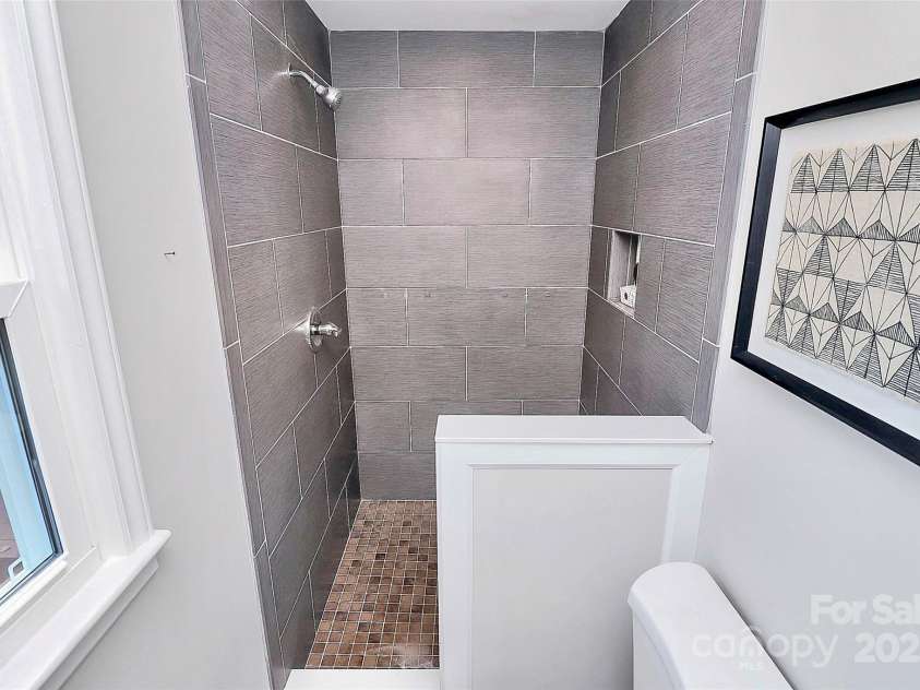 1420 Starbrook Drive, Charlotte, NC 28210.  MLS# CAR4314473, YatesRealty ID 5428. Tiled shower