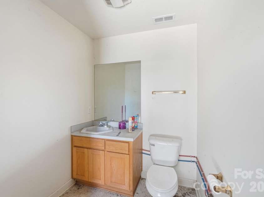 600 Frontier Road, Clover, SC 29710.  MLS# CAR4429222, YatesRealty ID 54284. Half bath in workshop
