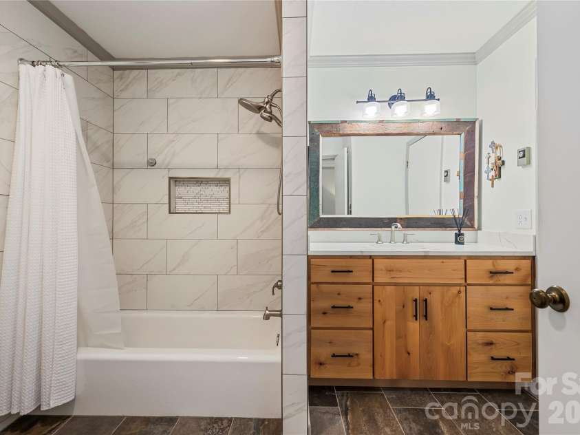 109 Middle Connestee Trail, Brevard, NC 28712.  MLS# CAR4429335, YatesRealty ID 54285. 