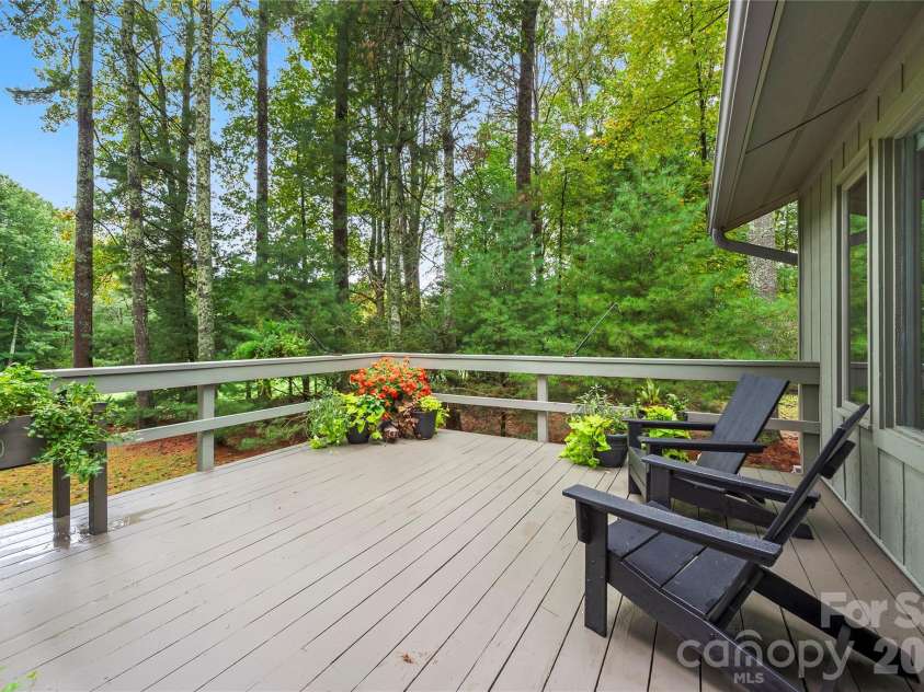 109 Middle Connestee Trail, Brevard, NC 28712.  MLS# CAR4429335, YatesRealty ID 54285. The perfect open deck to sunbathe and grill