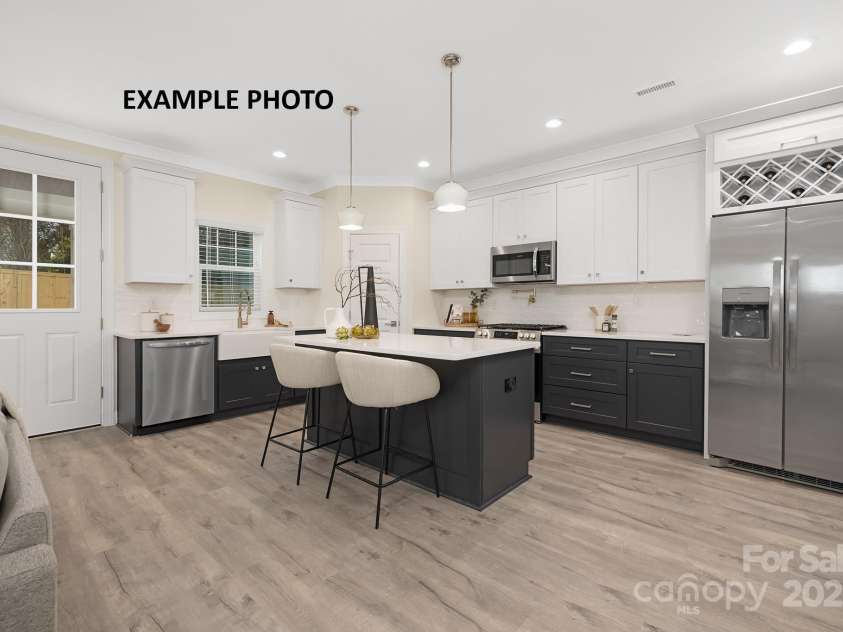 1002 Fairground Street, Charlotte, NC 28208.  MLS# CAR4198787, YatesRealty ID 5429. Staged photos of 1006 Fairground with  same layout.