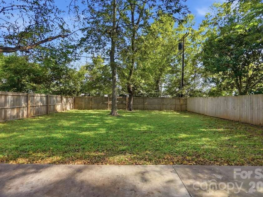 305 Harrison Street, Charlotte, NC 28208.  MLS# CAR4428943, YatesRealty ID 54298. Big Backyard with a Fence