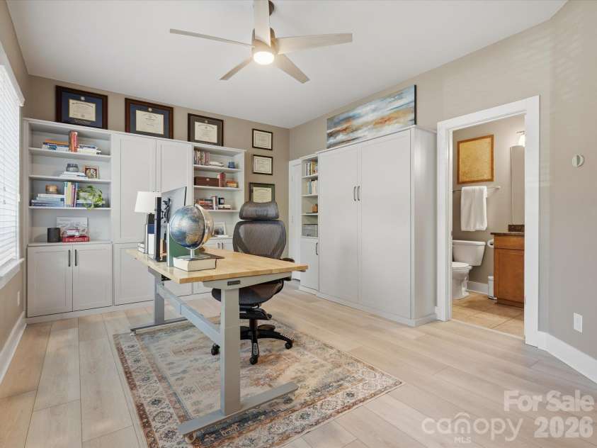 1806 Sunnyside Avenue, Charlotte, NC 28204.  MLS# CAR4428139, YatesRealty ID 54303. Lower level guest space- attached murphy bed and shelving