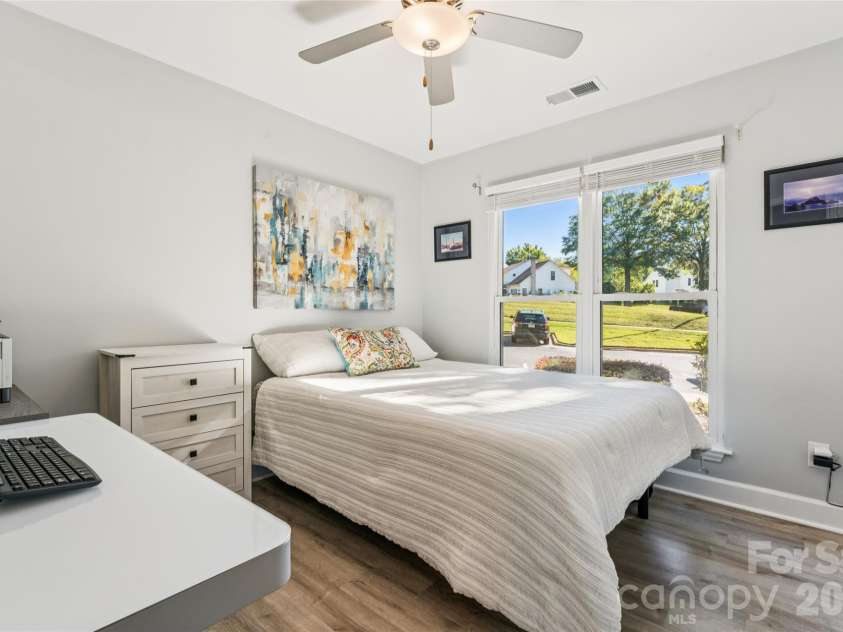18819 Vineyard Point Lane, Cornelius, NC 28031.  MLS# CAR4428312, YatesRealty ID 54307. Light filled Bedroom 2