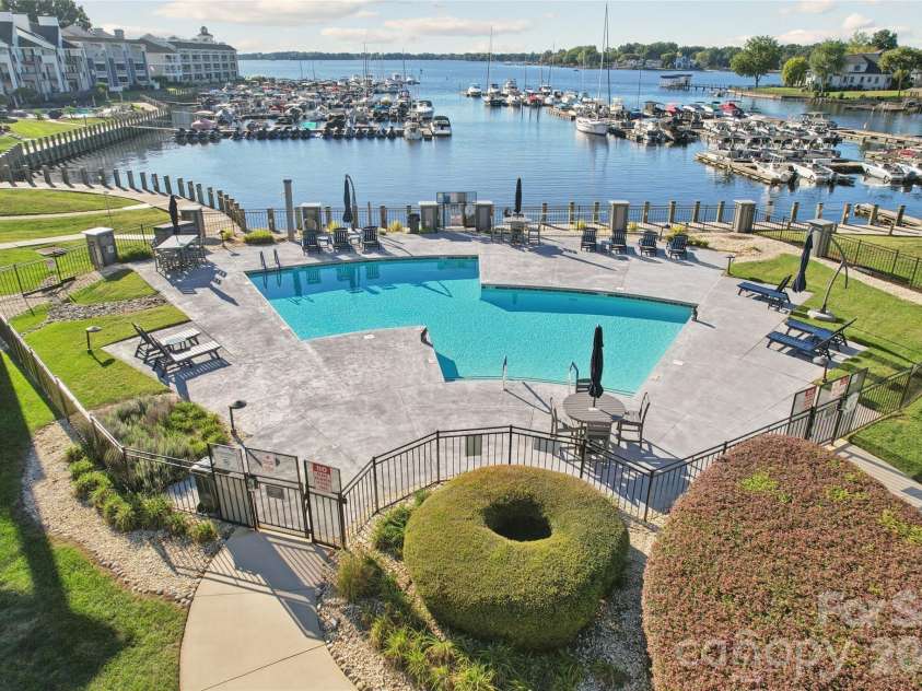 18819 Vineyard Point Lane, Cornelius, NC 28031.  MLS# CAR4428312, YatesRealty ID 54307. Newly renovated lakeside pool area