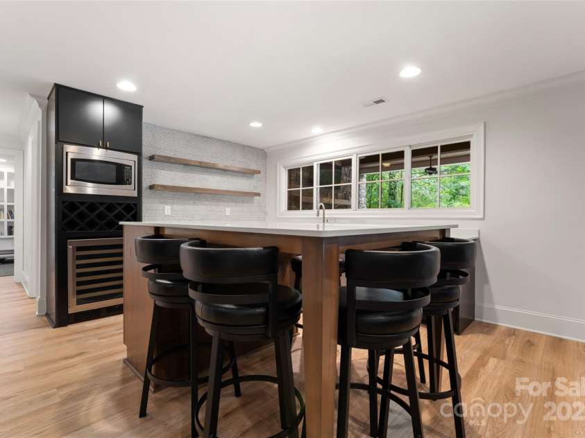 235 Grey Road, Davidson, NC 28036.  MLS# CAR4189810, YatesRealty ID 5432. Basement kitchen area