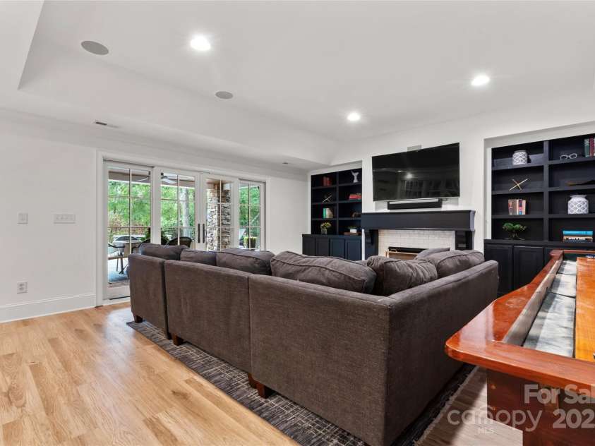 235 Grey Road, Davidson, NC 28036.  MLS# CAR4189810, YatesRealty ID 5432. Basement Living Room