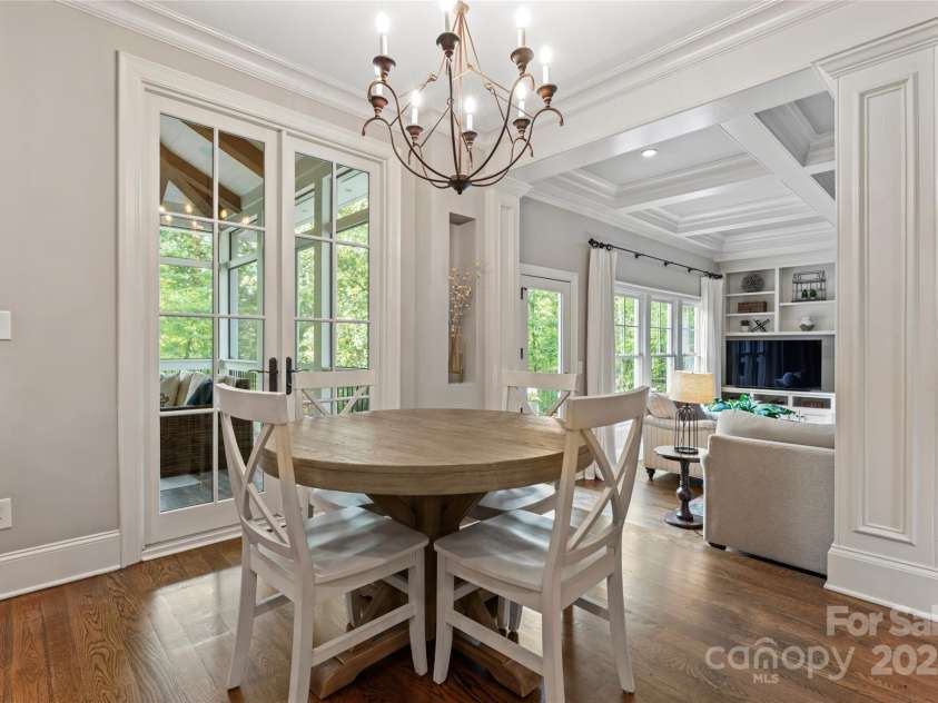 235 Grey Road, Davidson, NC 28036.  MLS# CAR4189810, YatesRealty ID 5432. Screen porch off of kitchen