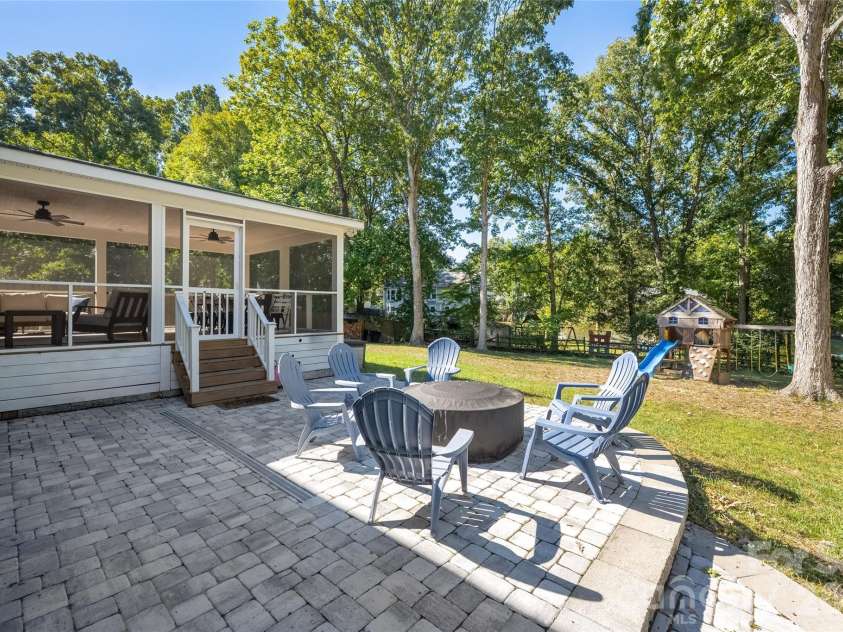 2620 Willowdale Lane, Matthews, NC 28105.  MLS# CAR4426974, YatesRealty ID 54324. Added hardscape is perfect for grilling, or enjoying a fire on a cool evening.