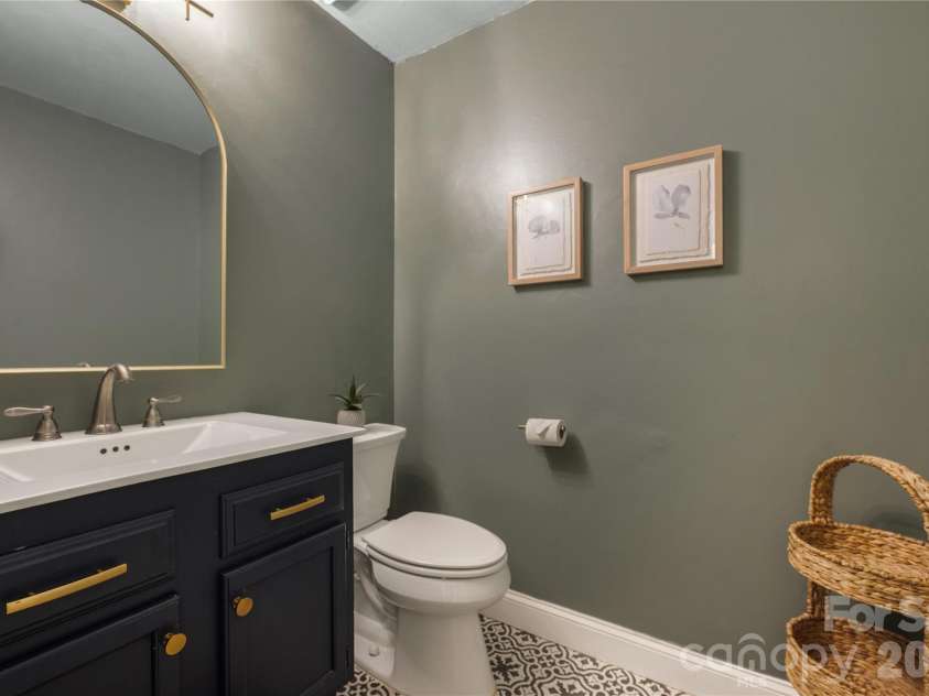 2620 Willowdale Lane, Matthews, NC 28105.  MLS# CAR4426974, YatesRealty ID 54324. Half bathroom with decorative flooring.