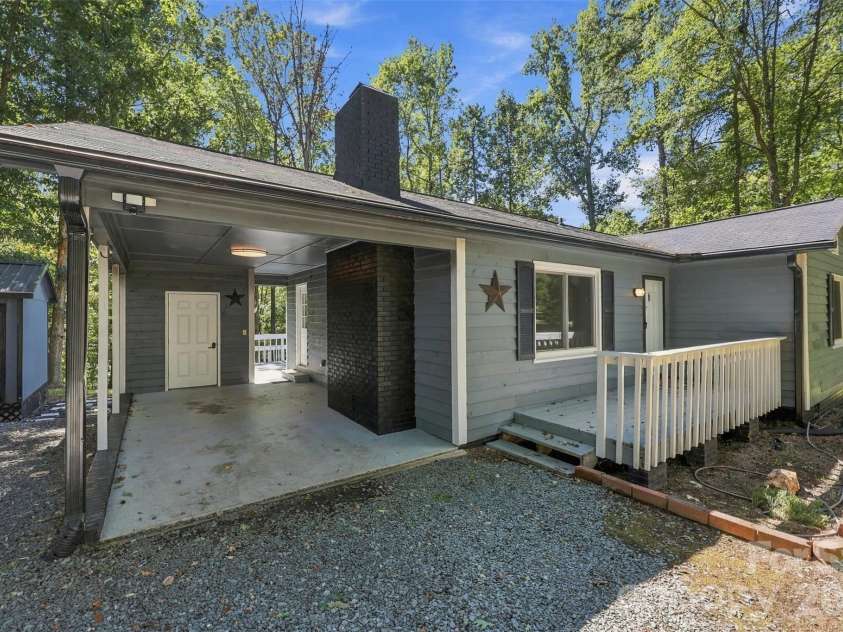 2909 Matoka Trail, Matthews, NC 28104.  MLS# CAR4426657, YatesRealty ID 54325. Car port with locked storage space