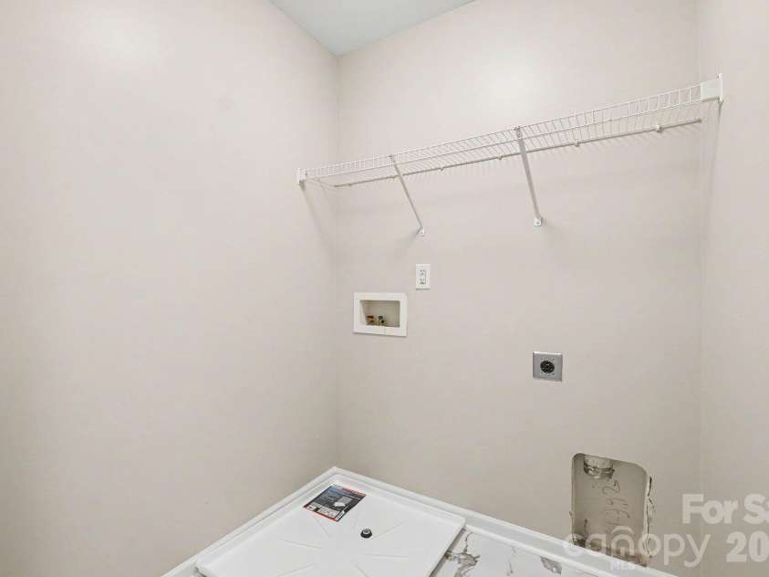 6826 Broad Valley Court, Charlotte, NC 28216.  MLS# CAR4426143, YatesRealty ID 54333. Laundry room