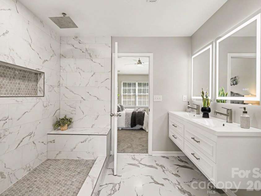 6826 Broad Valley Court, Charlotte, NC 28216.  MLS# CAR4426143, YatesRealty ID 54333. Updated primary bath