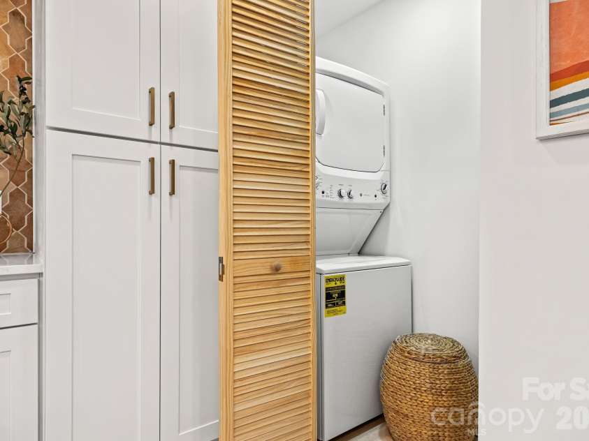 8711 Ellis Road, Waxhaw, NC 28173.  MLS# CAR4425278, YatesRealty ID 54336. LAUNDRY CLOSET WITH STORAGE