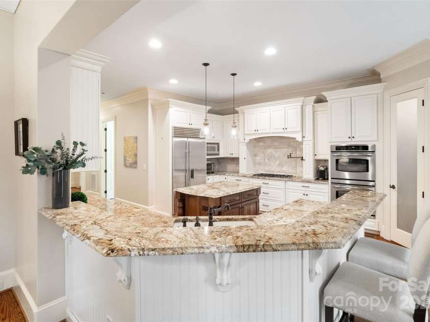 9011 Pine Laurel Drive, Weddington, NC 28104.  MLS# CAR4241805, YatesRealty ID 5434. Breakfast Bar