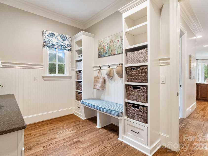 9011 Pine Laurel Drive, Weddington, NC 28104.  MLS# CAR4241805, YatesRealty ID 5434. Drop Zone with shelving & bench