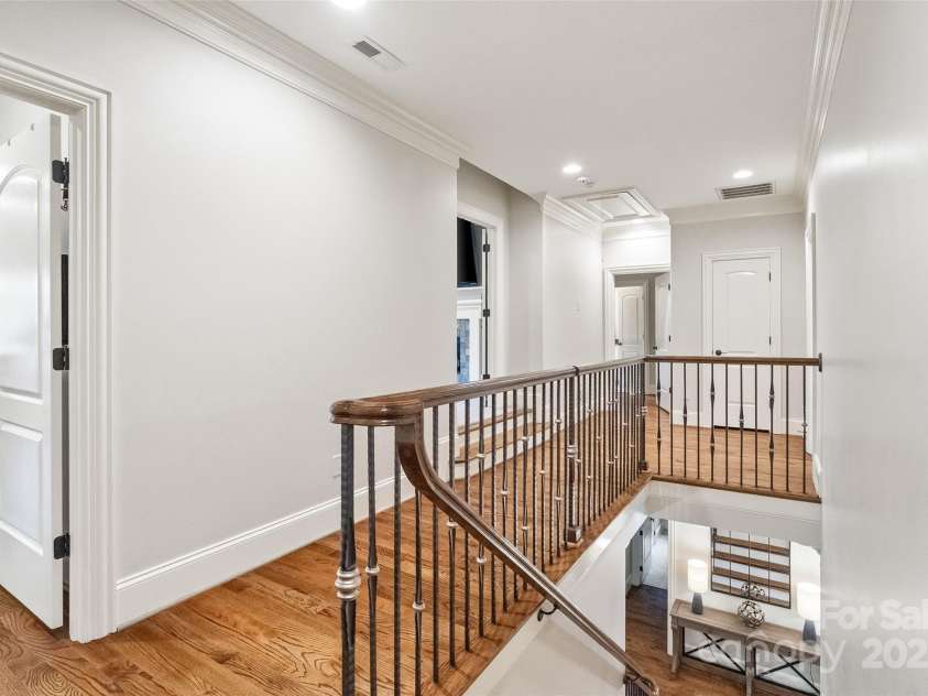 9011 Pine Laurel Drive, Weddington, NC 28104.  MLS# CAR4241805, YatesRealty ID 5434. Wide staircase