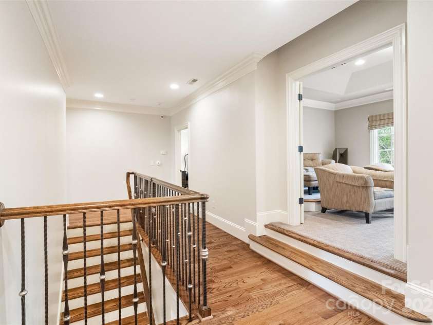 9011 Pine Laurel Drive, Weddington, NC 28104.  MLS# CAR4241805, YatesRealty ID 5434. Wide Upstair Hallways with Gleaming Hardwoods