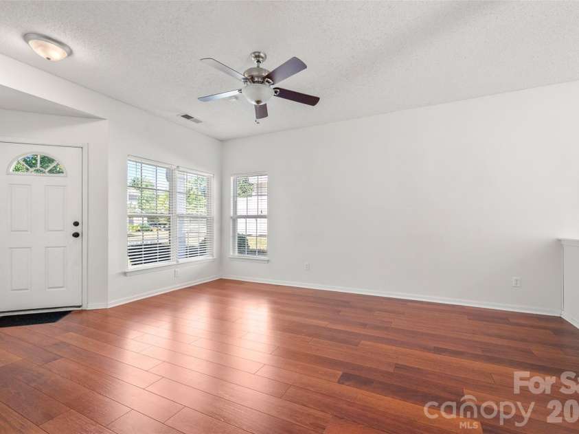2738 Mill Valley Court, Matthews, NC 28105.  MLS# CAR4424420, YatesRealty ID 54340. Bright, airy main level design highlighting the seamless connection between the entryway and main living area.
