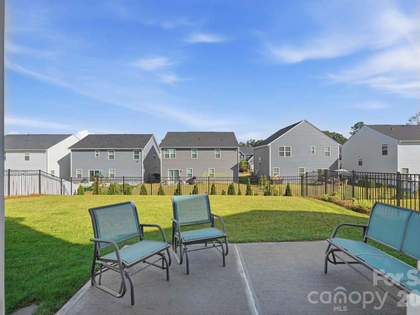 1857 Giana Lane, Monroe, NC 28112.  MLS# CAR4422864, YatesRealty ID 54344. Back patio with view