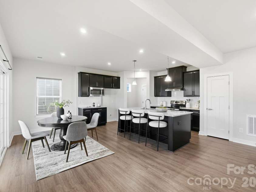 1857 Giana Lane, Monroe, NC 28112.  MLS# CAR4422864, YatesRealty ID 54344. Kitchen and Dining area