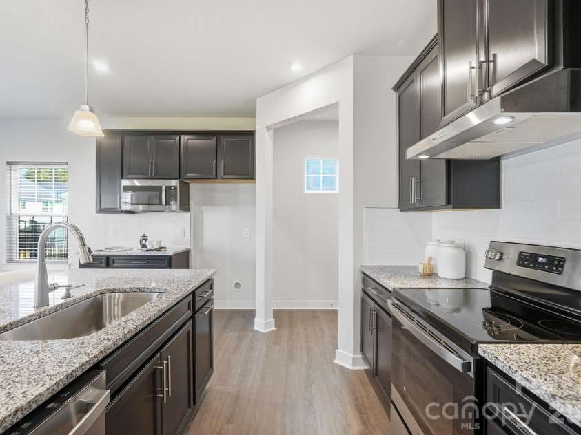 1857 Giana Lane, Monroe, NC 28112.  MLS# CAR4422864, YatesRealty ID 54344. Kitchen and landing zone