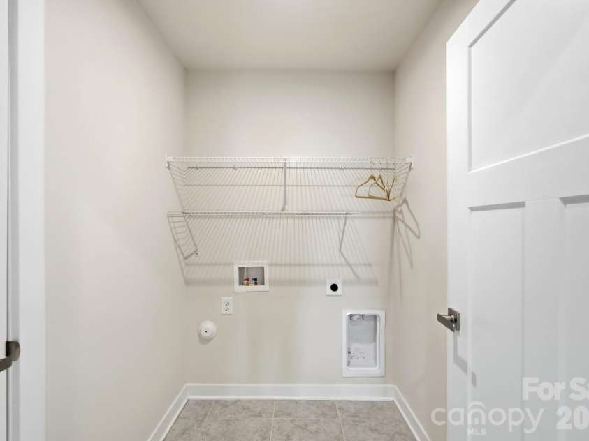 1857 Giana Lane, Monroe, NC 28112.  MLS# CAR4422864, YatesRealty ID 54344. Laundry closet