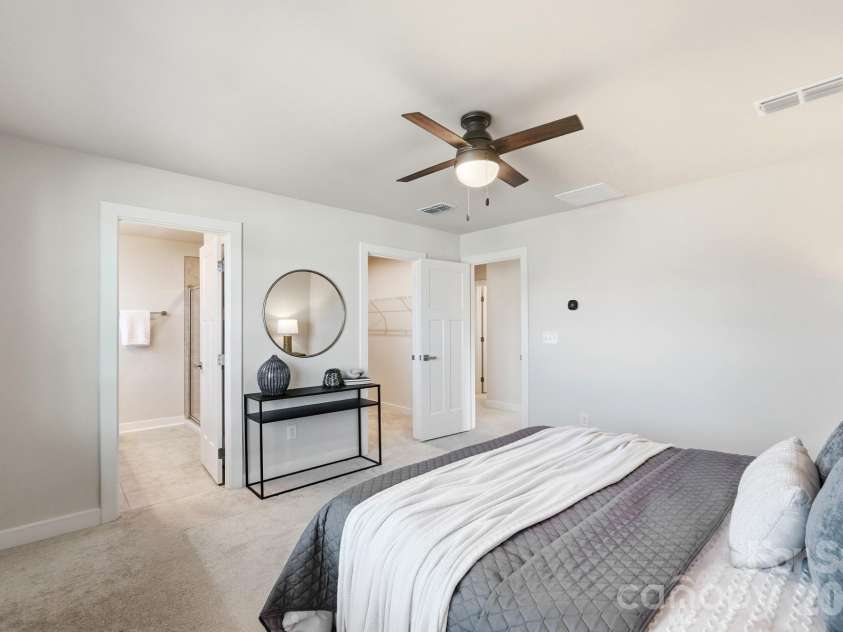 1857 Giana Lane, Monroe, NC 28112.  MLS# CAR4422864, YatesRealty ID 54344. Primary bedroom suite featuring a spacious walk-in closet.