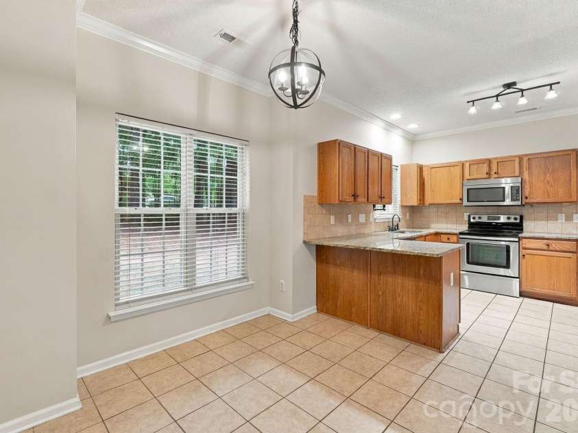 12806 English Walnut Lane, Charlotte, NC 28215.  MLS# CAR4420536, YatesRealty ID 54347. 