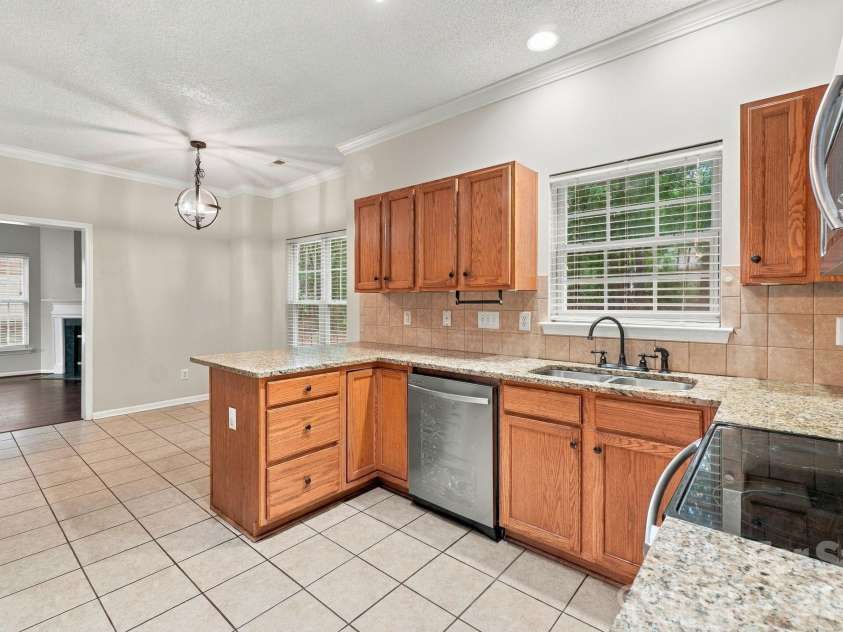 12806 English Walnut Lane, Charlotte, NC 28215.  MLS# CAR4420536, YatesRealty ID 54347. 